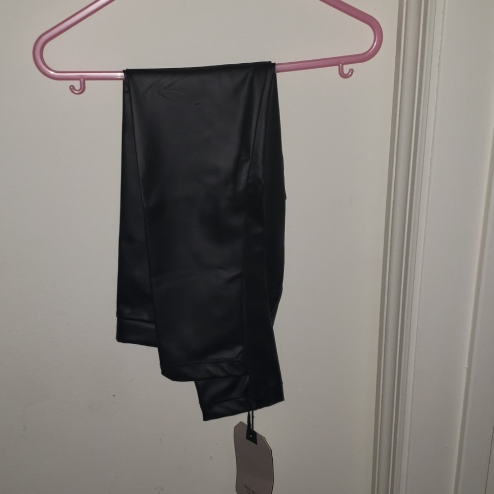 Black leather jeggings